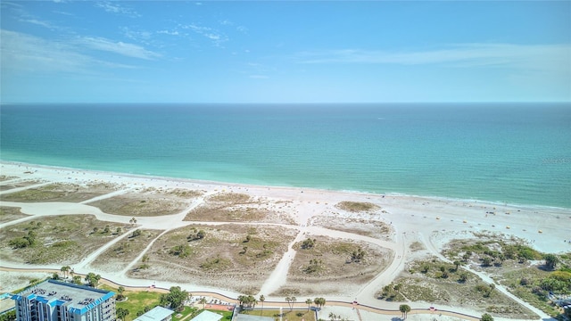 bird's eye view with a water view and a view of the beach