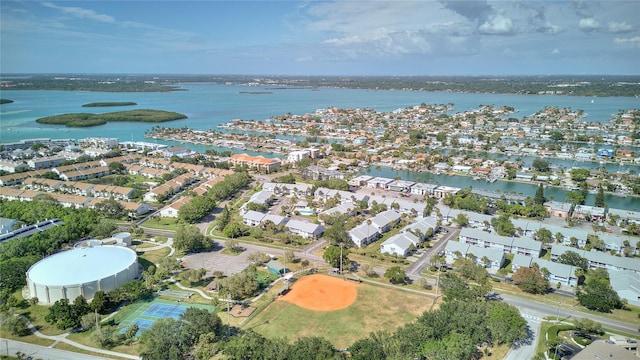 birds eye view of property featuring a water view and a residential view