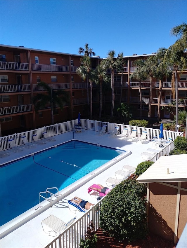 pool featuring fence