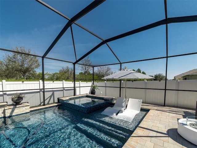 view of swimming pool with fence private yard, a lanai, a patio, and a pool with connected hot tub