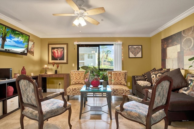 sitting room with light tile patterned floors, ceiling fan, and ornamental molding