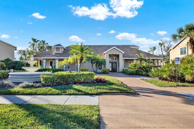 view of front of home featuring stucco siding