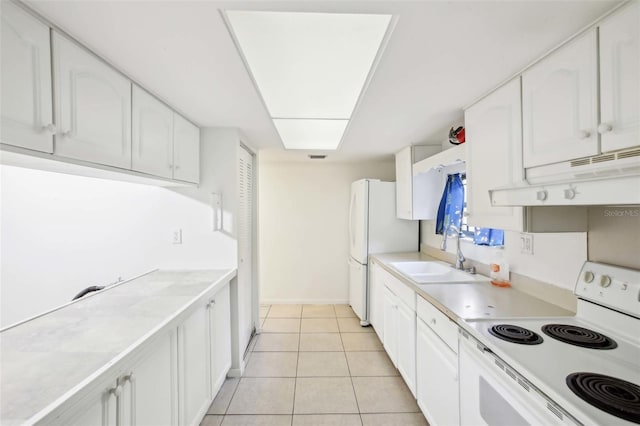 kitchen with light countertops, white cabinets, a sink, white appliances, and under cabinet range hood