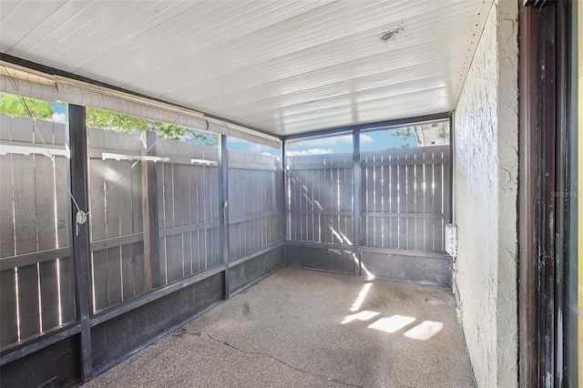 unfurnished sunroom with plenty of natural light