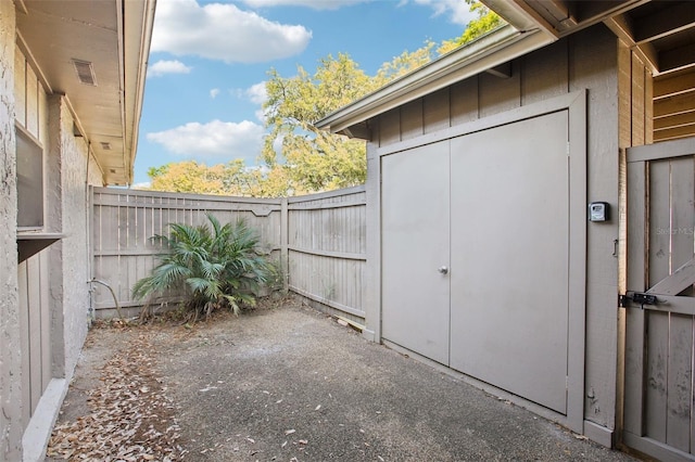 exterior space featuring a fenced backyard