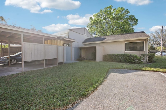 exterior space featuring a carport