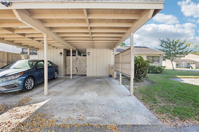 view of parking with a carport