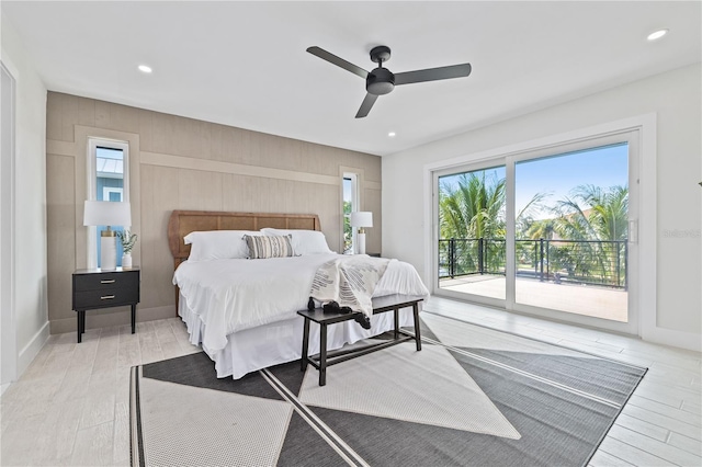 bedroom with access to exterior, recessed lighting, and light wood-style floors