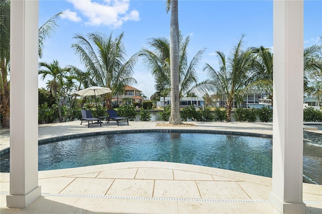 outdoor pool featuring a patio area