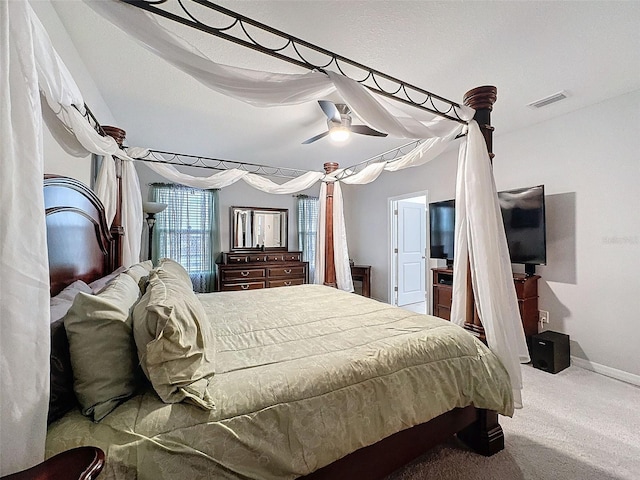 bedroom with a ceiling fan, carpet, visible vents, and baseboards