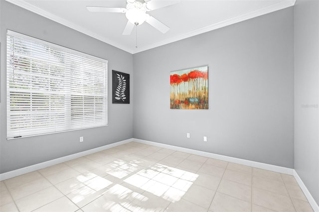 unfurnished room featuring light tile patterned floors, a ceiling fan, baseboards, and ornamental molding