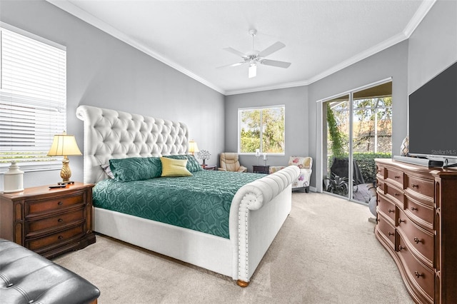 carpeted bedroom featuring a ceiling fan, crown molding, and access to outside