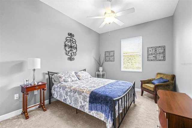 bedroom with carpet, baseboards, and ceiling fan