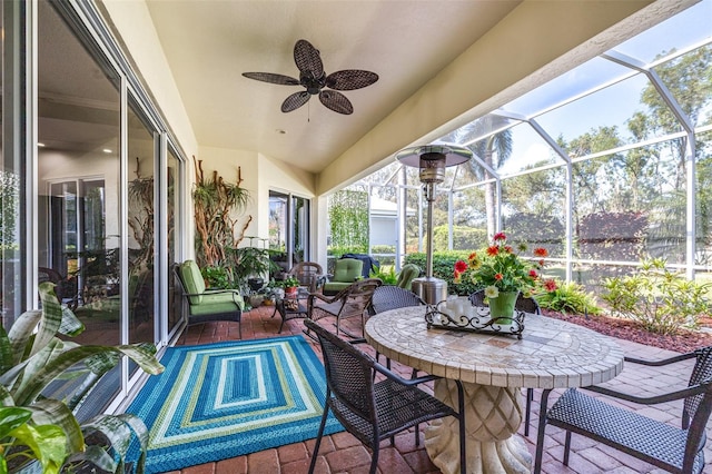 sunroom / solarium with ceiling fan