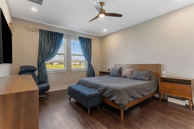 bedroom featuring a ceiling fan, baseboards, wood finished floors, and recessed lighting