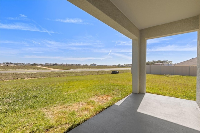 view of yard with a patio area and fence