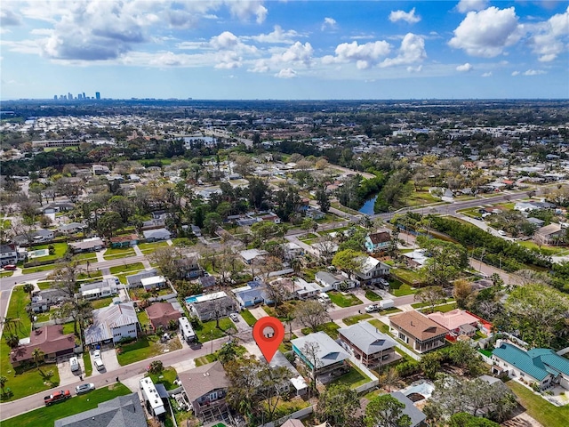 birds eye view of property with a residential view