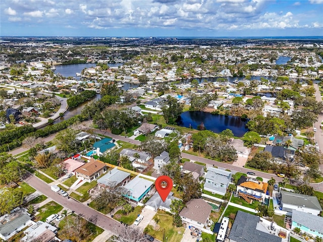 aerial view featuring a water view and a residential view