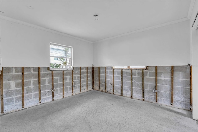 spare room featuring crown molding