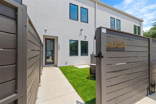 exterior space featuring stucco siding