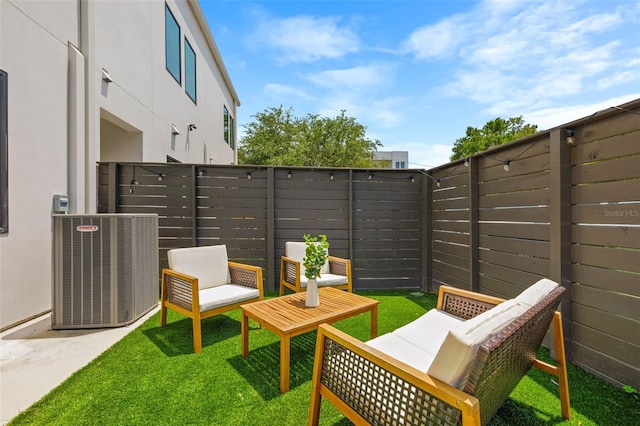 view of patio featuring fence and central air condition unit