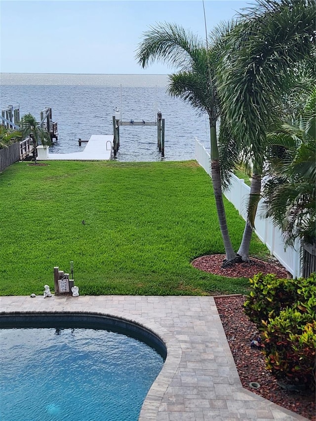 5241 W Shore Dr, New Port Richey, FL 34652 - dock with a water view and an outdoor pool