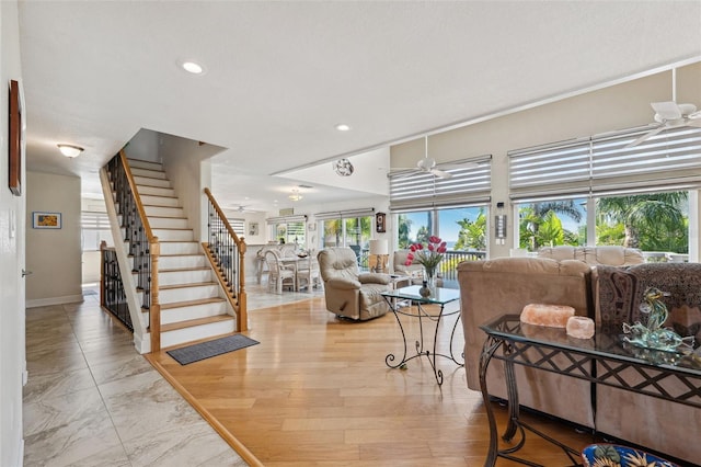 5241 W Shore Dr, New Port Richey, FL 34652 - living room featuring ceiling fan, stairway, recessed lighting, and baseboards