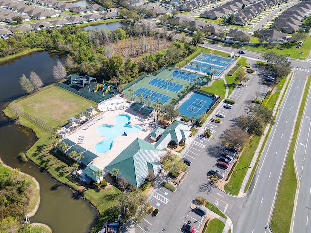 aerial view featuring a water view and a residential view