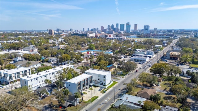 birds eye view of property with a view of city