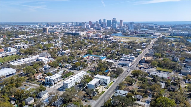 bird's eye view featuring a water view and a city view