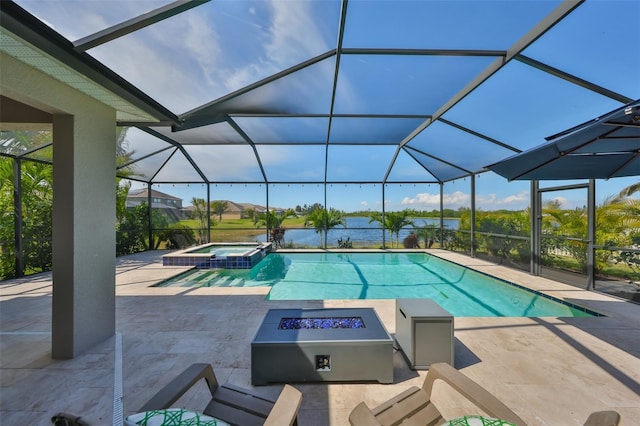 view of swimming pool with a patio, a lanai, and a pool with connected hot tub