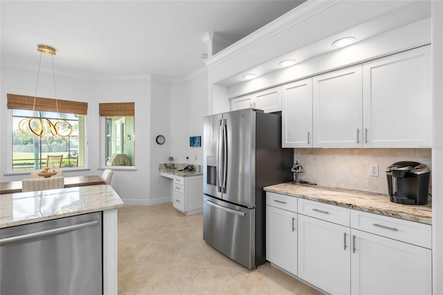 kitchen featuring ornamental molding, light stone counters, tasteful backsplash, stainless steel appliances, and white cabinets