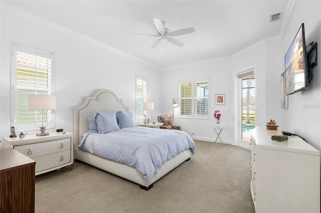 bedroom with ornamental molding, multiple windows, access to exterior, and light carpet