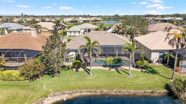 aerial view featuring a residential view and a water view