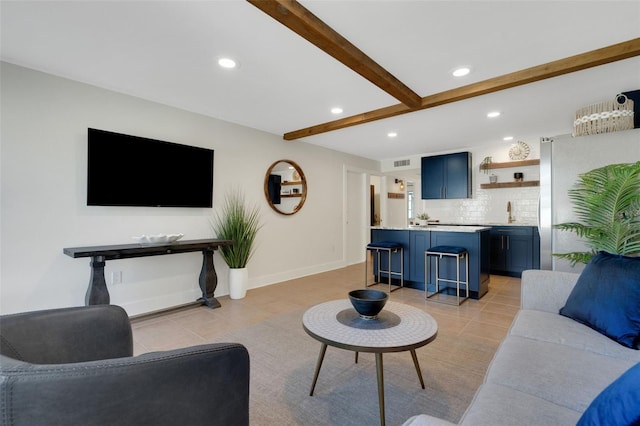 living area featuring light tile patterned floors, visible vents, beam ceiling, and recessed lighting