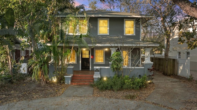 view of front of home with fence