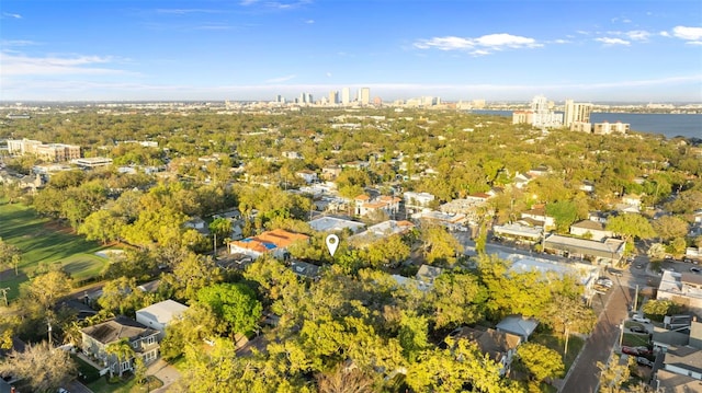 bird's eye view featuring a water view and a city view