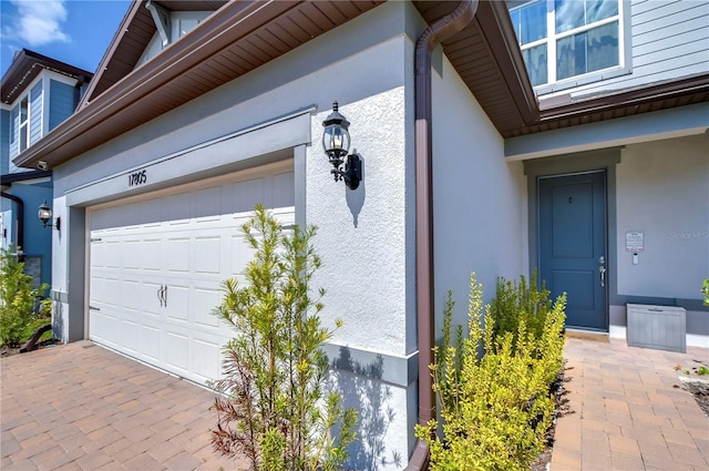 garage featuring driveway