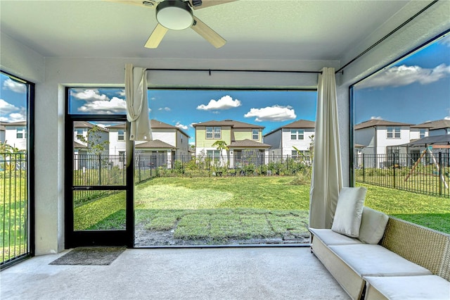 sunroom with a residential view