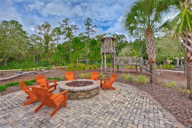 view of patio featuring an outdoor fire pit