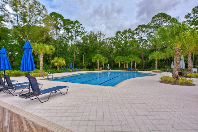 pool featuring a patio