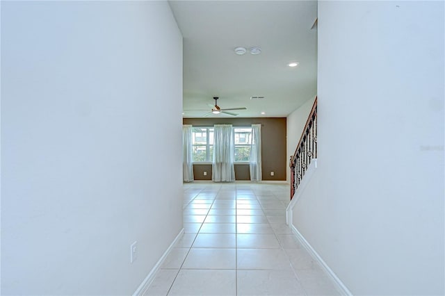 17805 Everlong Dr, Land O Lakes, FL 34638 - hall with stairway, light tile patterned floors, and recessed lighting