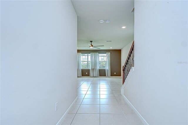 17805 Everlong Dr, Land O Lakes, FL 34638 - hall with stairway, light tile patterned floors, and recessed lighting
