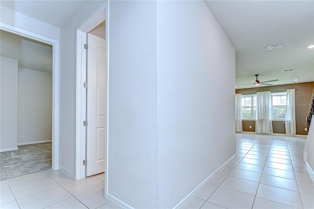 17805 Everlong Dr, Land O Lakes, FL 34638 - hallway with light tile patterned floors and recessed lighting