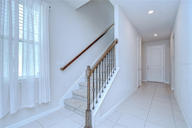 17805 Everlong Dr, Land O Lakes, FL 34638 - stairway with tile patterned floors and recessed lighting