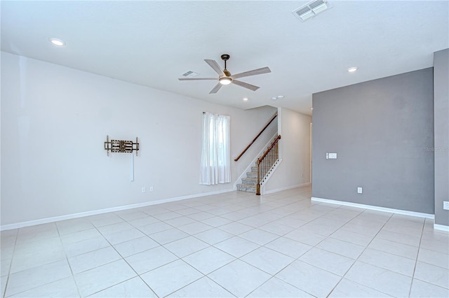 17805 Everlong Dr, Land O Lakes, FL 34638 - empty room with stairway, ceiling fan, light tile patterned flooring, and recessed lighting