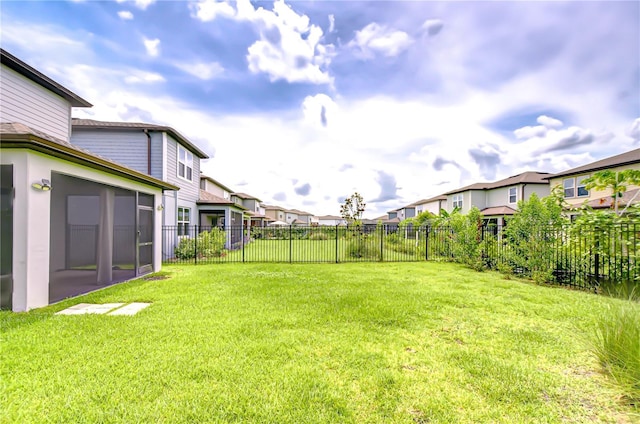 17805 Everlong Dr, Land O Lakes, FL 34638 - fenced backyard with a residential view and a sunroom