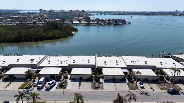 bird's eye view featuring a view of city and a water view