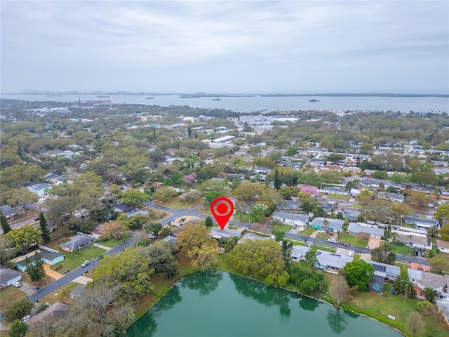 bird's eye view with a residential view and a water view