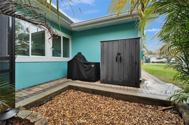 doorway to property with stucco siding